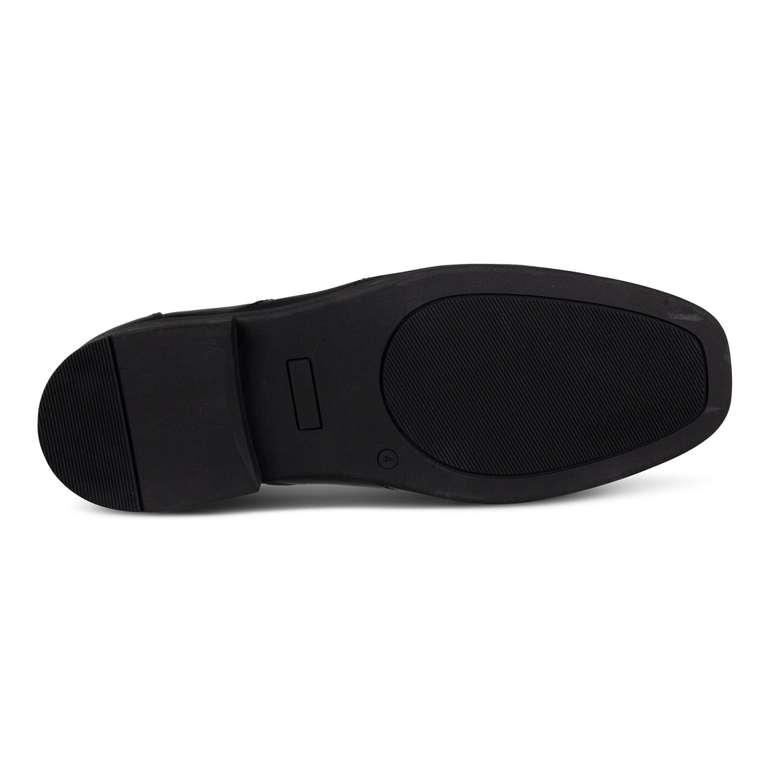 sole of Boys slip on black leather school shoes