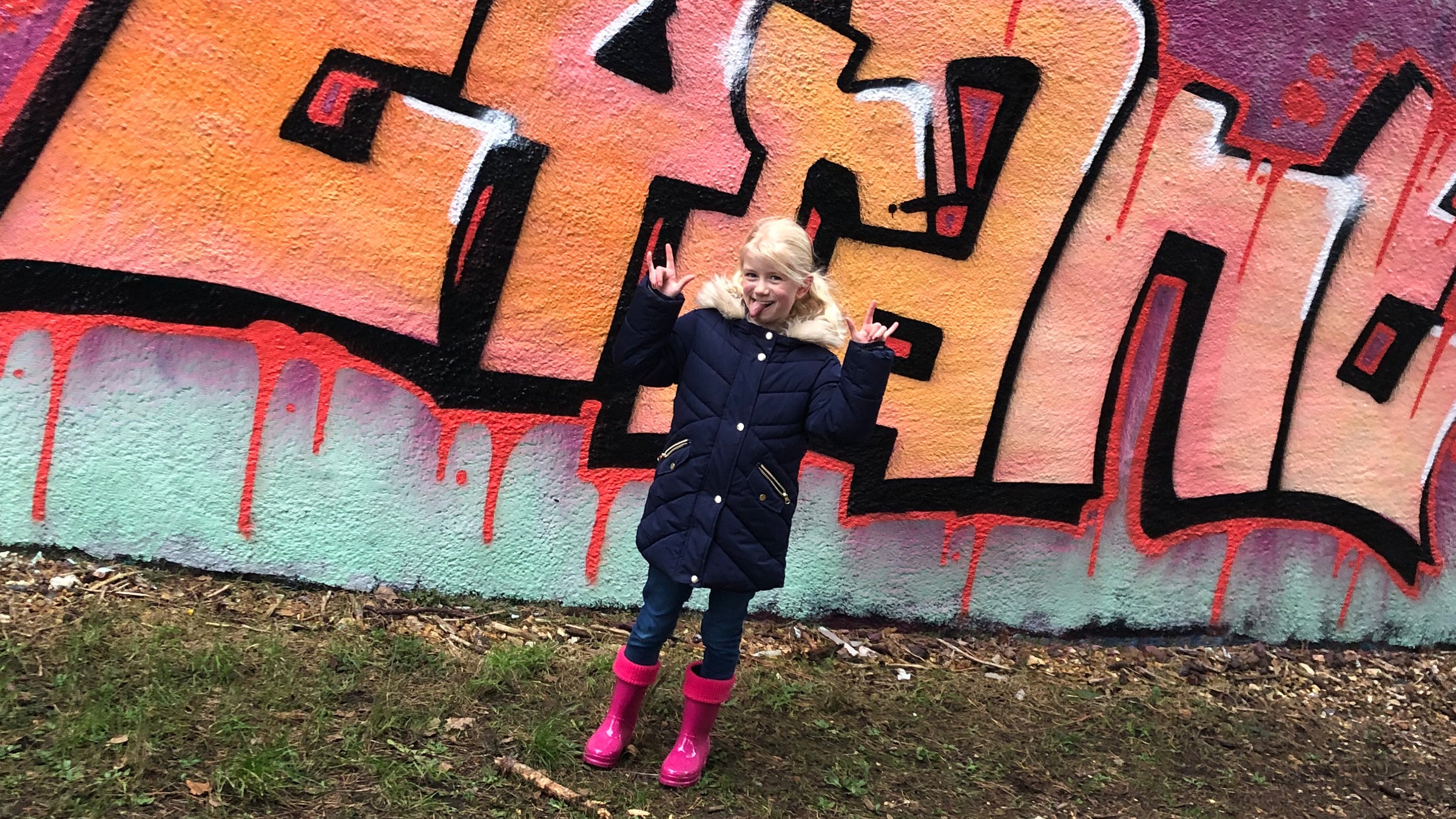 Girl with pink wellies